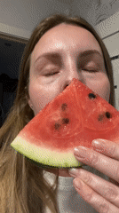 Family shares watermelon and wine in Noviy, Russia