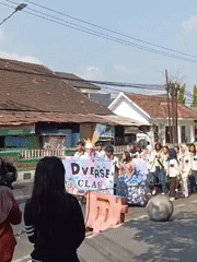 Costumed student parade rolls through Kediri City streets