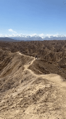 Hiker documents mountain trail journey near Lake Issyk-Kul, Kyrgyzstan