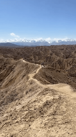 Hiker documents mountain trail journey near Lake Issyk-Kul, Kyrgyzstan