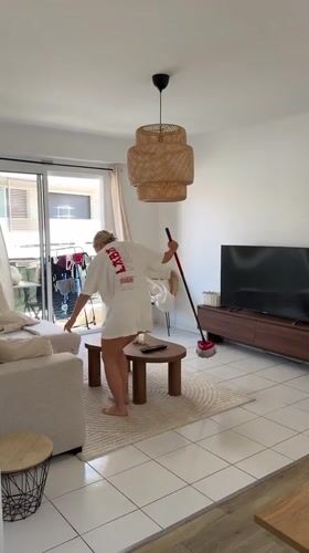 Morning cleaning routine captured in Cannes home with Pomeranian