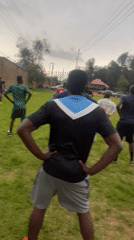 Outdoor training session on a grassy field in Jos, Nigeria