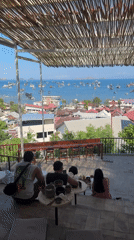 Elevated harbor cafe views over Labuan Bajo's bay