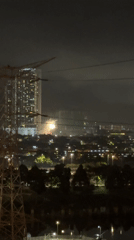 Fireworks light up Kuala Lumpur skyline near construction site