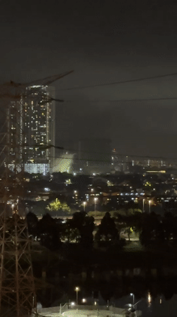 Fireworks light up Kuala Lumpur skyline near construction site