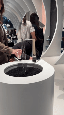 Design exhibition showcases bathroom fixtures and modern displays in Rho