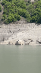 Witness documents water landscape with rocky shoreline in Georgia