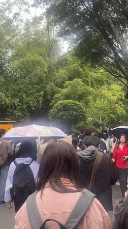 Students walk through Chongqing university area after midnight