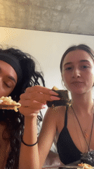 Women document meal preparation and eating in London kitchen