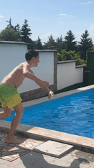 Boy enjoys afternoon swim session in Markovo pool