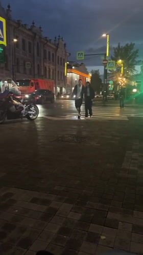 Wet streets and city details in Krasnoyarsk on a June evening