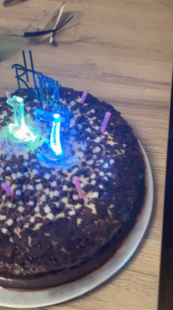 Birthday cake with pink candles documented in Karlsruhe