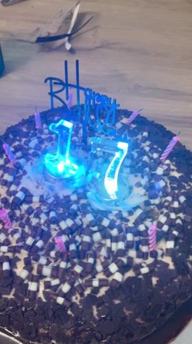 Birthday cake with pink candles documented in Karlsruhe