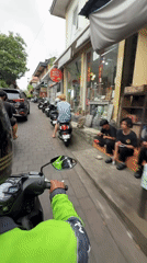 Morning scooter tour through Ubud's pottery markets documented