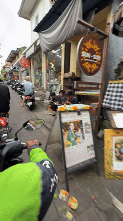 Morning scooter tour through Ubud's pottery markets documented
