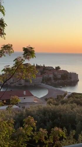 Golden hour illuminates historic Sveti Stefan island resort