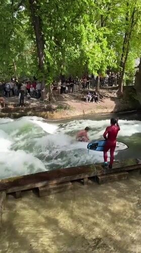 River surfer falls from board in Munich