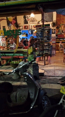 Nighttime street life documented across Denpasar entertainment districts