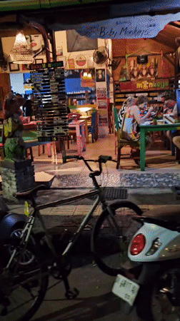 Nighttime street life documented across Denpasar entertainment districts