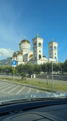 Driver captures white-domed church in Bar, Montenegro