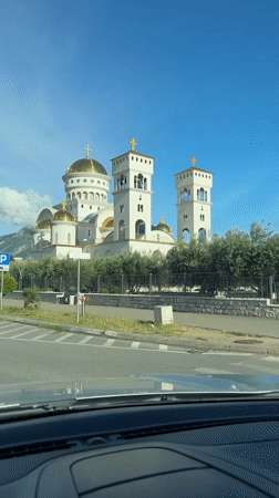 Driver captures white-domed church in Bar, Montenegro