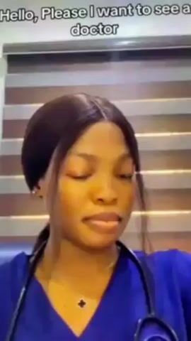 A woman wearing a blue medical uniform and a stethoscope smiles at the camera and introduces herself as Dr. Amanda. She asks how she can help. The video appears to be filmed in a room with horizontal blinds in the background.