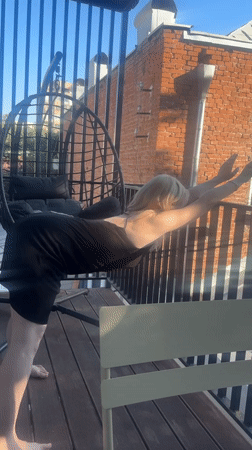 Yoga on a Tbilisi balcony, kittens on the rooftop next door