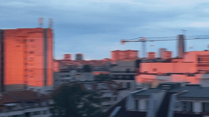 Sunset illuminates Sofia residential district with mountain backdrop