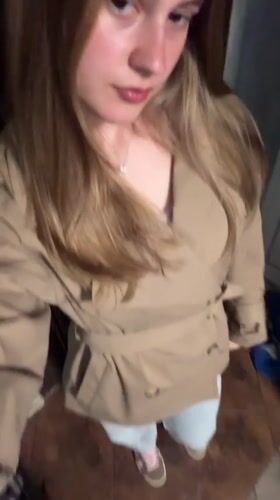 Woman takes mirror selfies indoors in Panagyurishte, Bulgaria