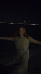 Evening on Perea beach, Thessaloniki lights across the bay