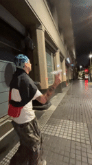Blue-haired person spotted on Buenos Aires street at night