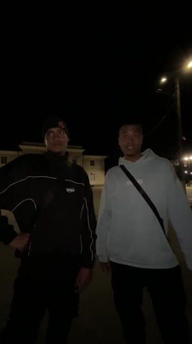 Two young men spotted standing outside at night in Lozarevo