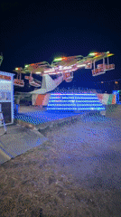 Summer funfair lights up Lozenets square at dusk