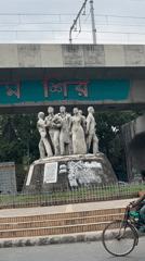 Morning scenes captured in Dhaka: statue monument and rickshaw travel
