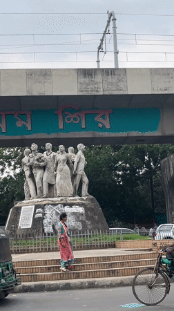 Morning scenes captured in Dhaka: statue monument and rickshaw travel