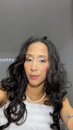 Selfie session in Porlamar, white top and pearl necklace