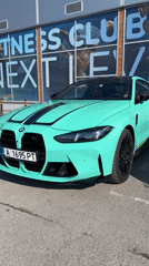 Man poses with BMW at Burgas fitness club