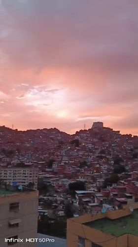 Caracas sunset views and collectible figurine displays captured evening