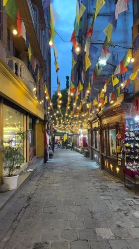 Evening market walk documented in Kathmandu's illuminated streets