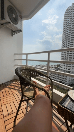Morning balcony breakfast captured in Pattaya City, Thailand