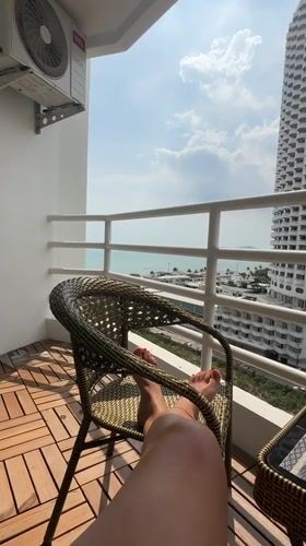 Morning balcony breakfast captured in Pattaya City, Thailand