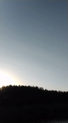 Two women enjoy afternoon boating on Russian lake