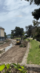 Excavator clears drainage canal in Budva, Montenegro