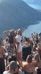 Mountainside outdoor event with scenic water views in Montenegro