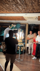 70th birthday party in Sredets with cake, sparklers, and dancing