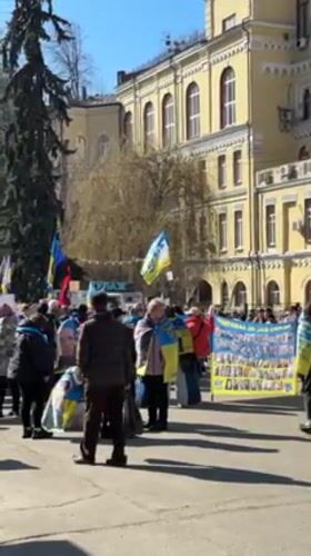 Ukrainian flag demonstration draws hundreds to central Kyiv square