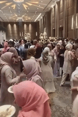 Traditional wedding reception underway at a Tangerang ballroom