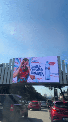 Traffic stops in Tbilisi as digital billboard displays soccer advertisement