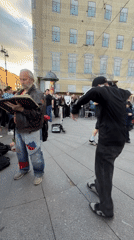 Live street performance draws a crowd in central Saint Petersburg