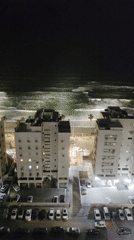 Nighttime coastal view captured in Bat Yam, Israel